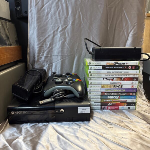 Xbox 360 E console with Kinect Sensor and included games.