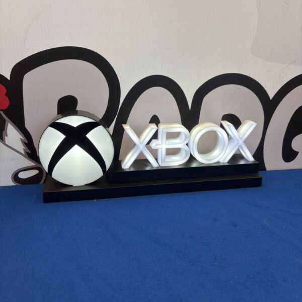 Illuminated Xbox LED display light for gaming setups.