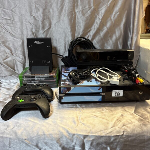 Microsoft Xbox One console with Kinect sensor and controller.