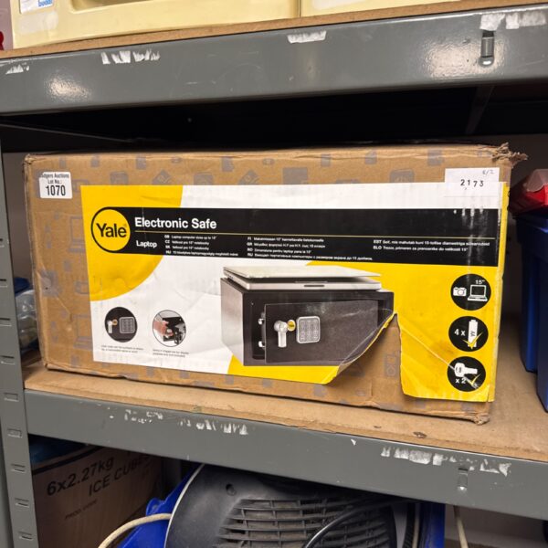 Yale electronic safe with keys present, for secure storage.