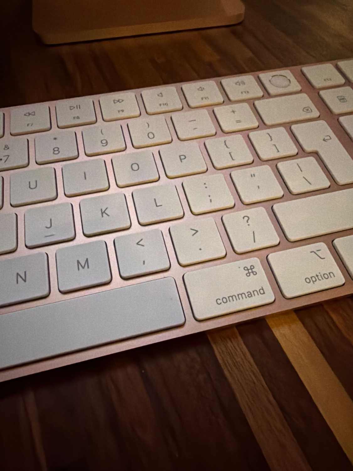 White Apple Wireless Keyboard for computers and Bluetooth devices.