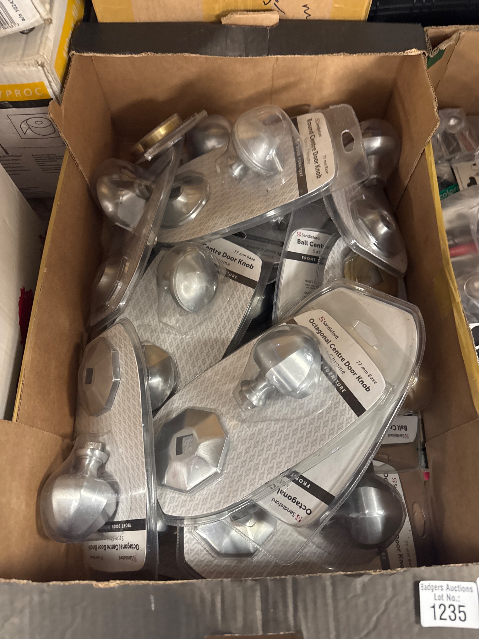 1235 Box of assorted new door handles