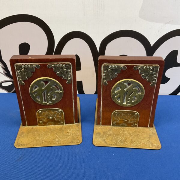 Antique Chinese cinnabar bookends, carved red lacquer pair.