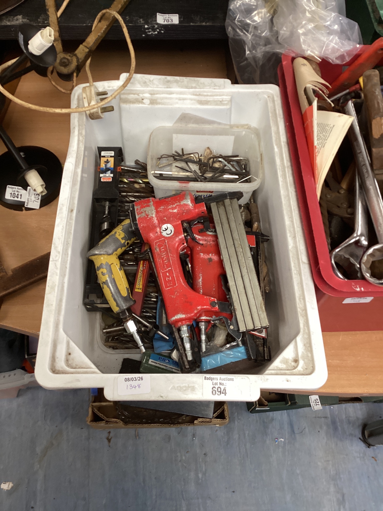 694 White box of mixed drill bits and air pressure drills and staple guns