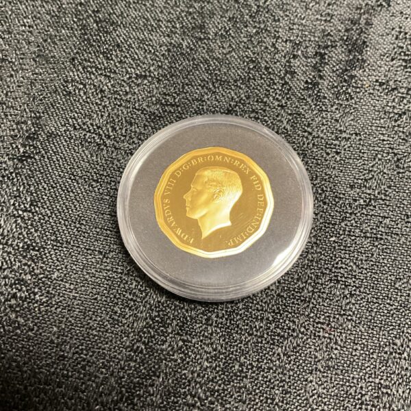 Front view of Edward VIII 1937 3d coin in capsule.