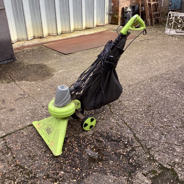 Used electric garden vac with collection bag, ideal for leaf removal.