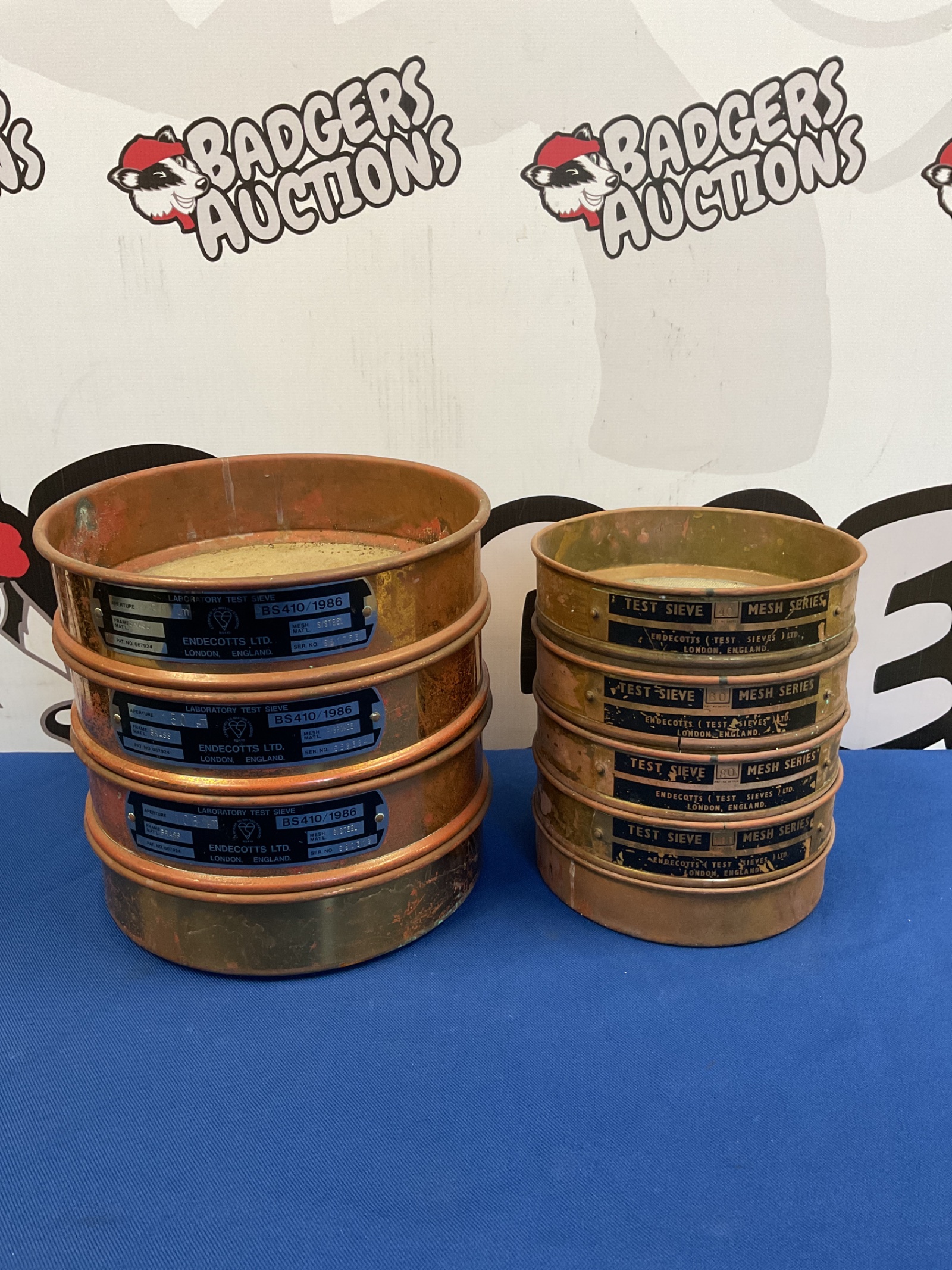 028 Vintage set of endecotts ltd laboratory copper test sieves