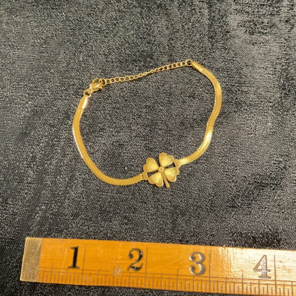 Gold plated lucky clover bracelet, vintage fashion jewellery.