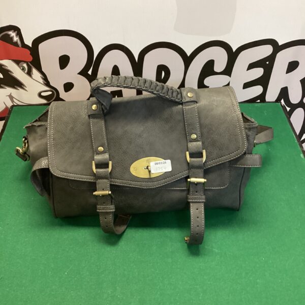 Grey leather handbag with flap closure and shoulder strap.