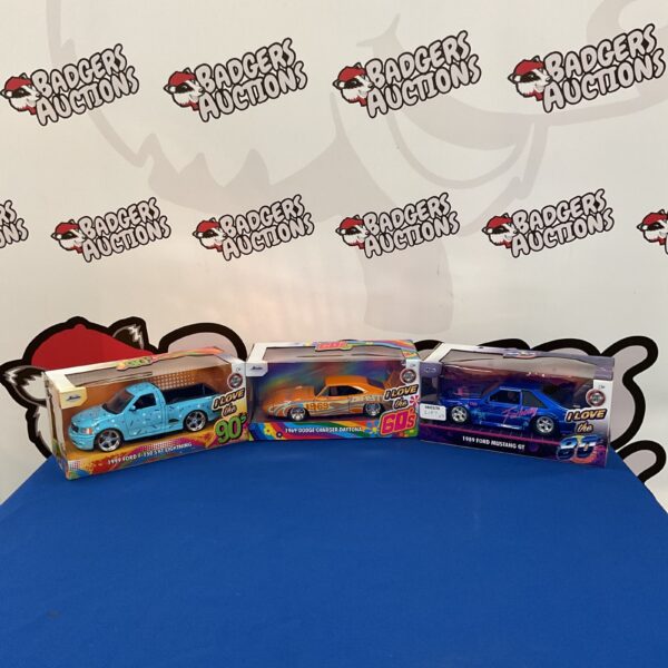 Jada diecast model cars lot featuring Ford, Dodge, and Mustang.