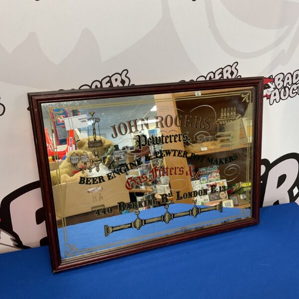 Vintage John Rogers beer engine mirror for pub advertising.