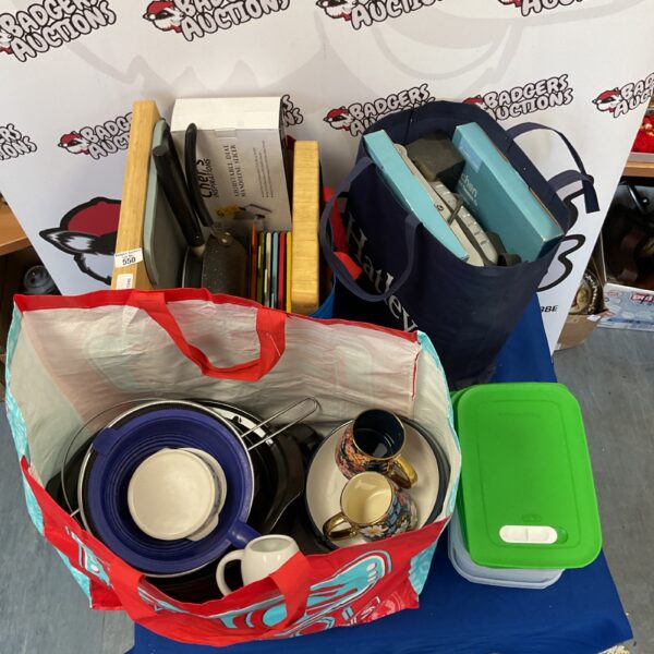 Assorted kitchenware bundle including pans, slow cooker and chopping boards.