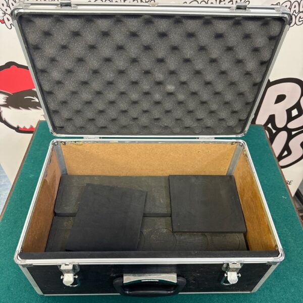Metal transit case with foam lining for equipment protection.