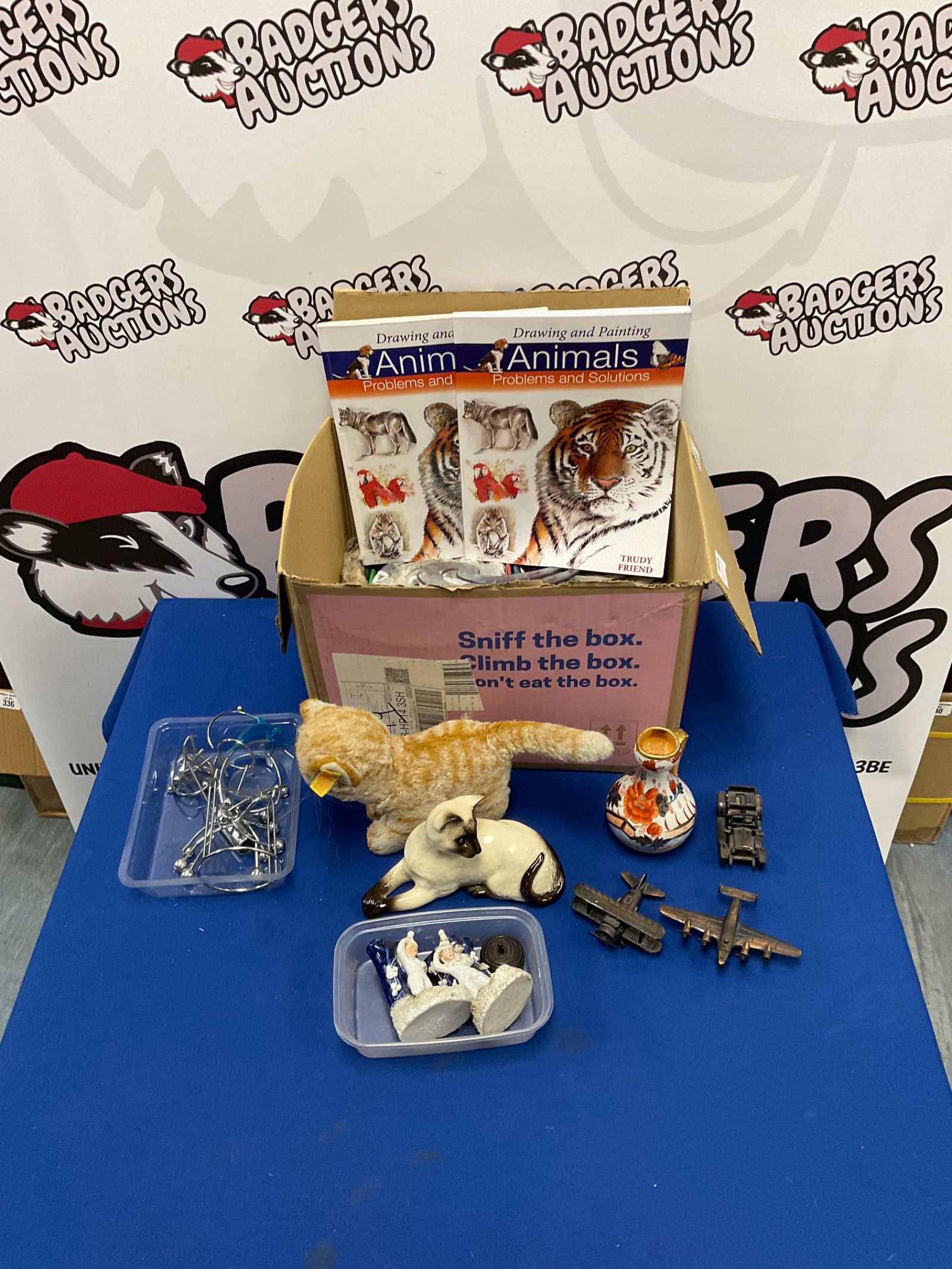 308 Box of mixed art supplies with royal doulton cat, novelty pencil sharpeners & Imari pattern jug
