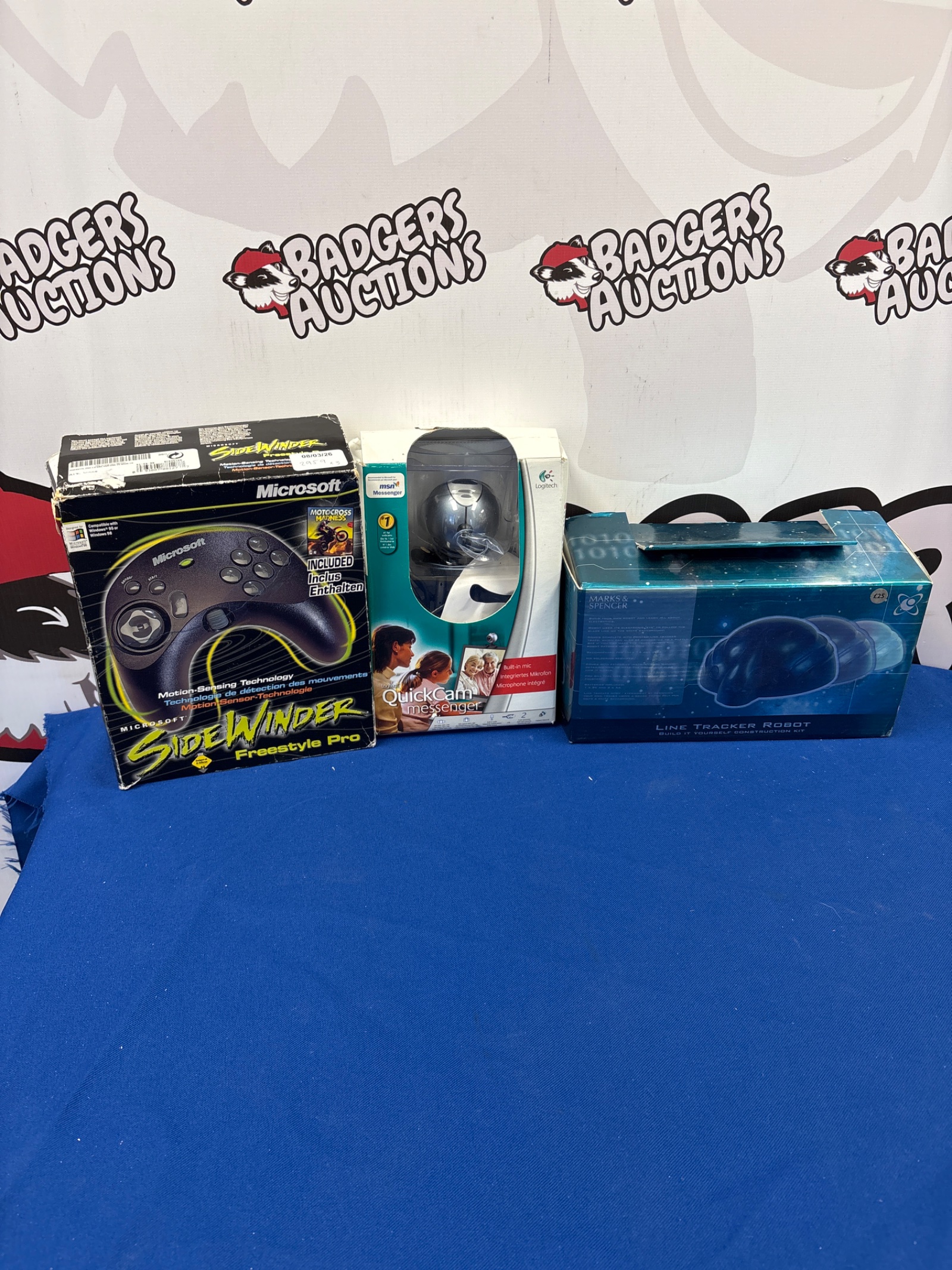 231 Mixed items, including Microsoft sidewinder, Logitech quick cam Mesenger and Marks & Spencer line tracker robot