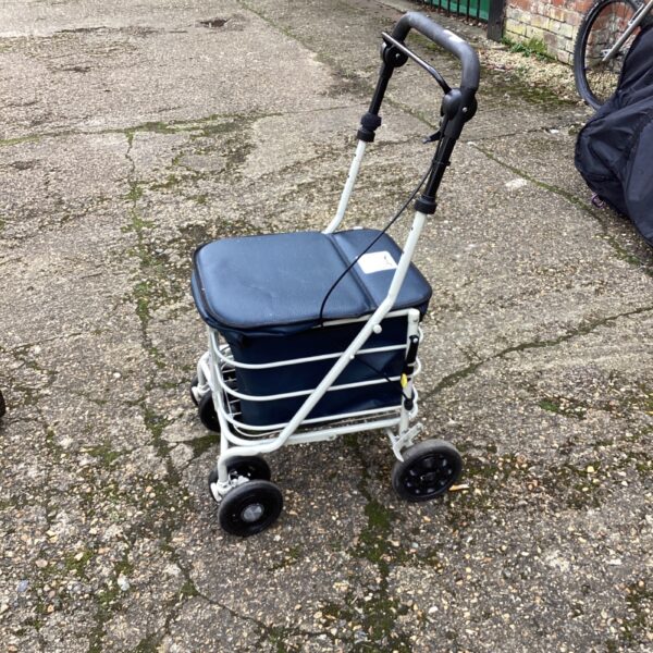 Used Prestige Engineering shopping trolley walker with basket.