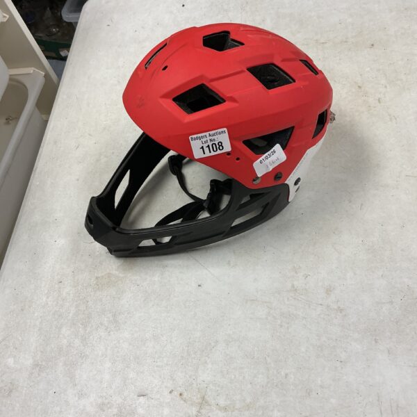 Red Slammer helmet for cycling and sports protection.