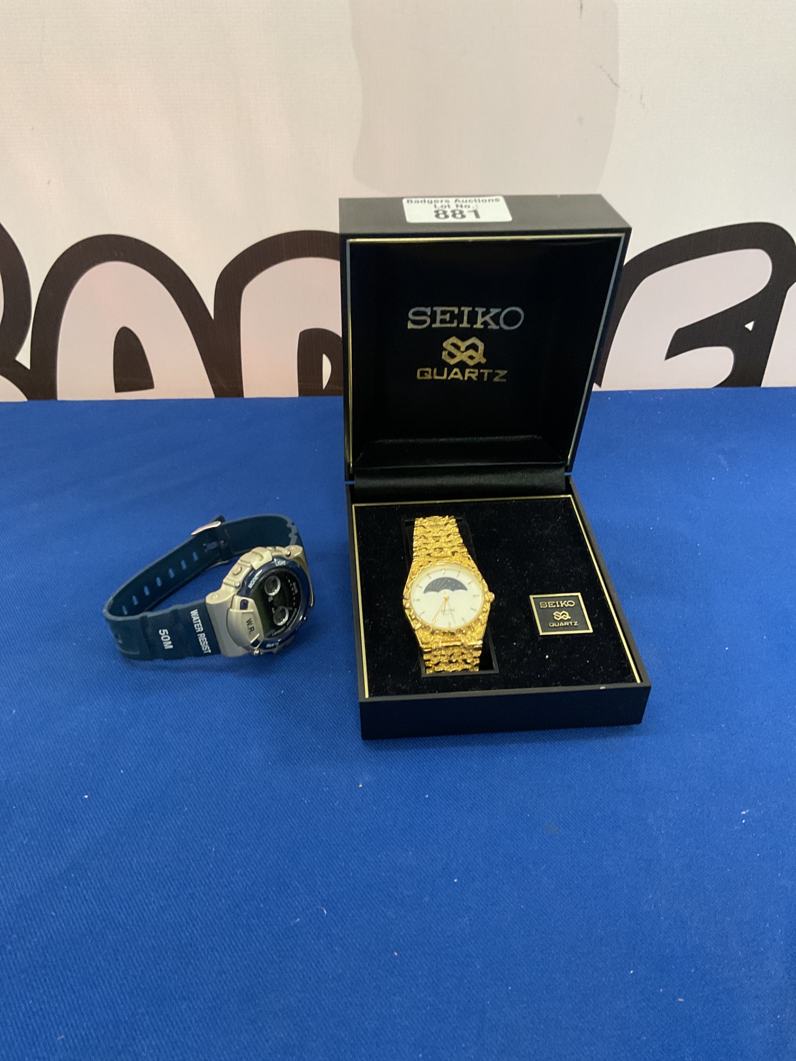 881 Seiko style gold coloured watch with sports watch