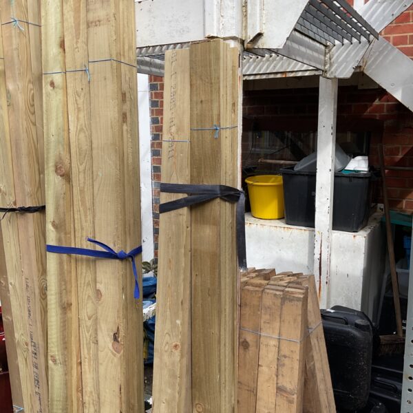 Three bundles of 6ft timber secured with blue strapping.