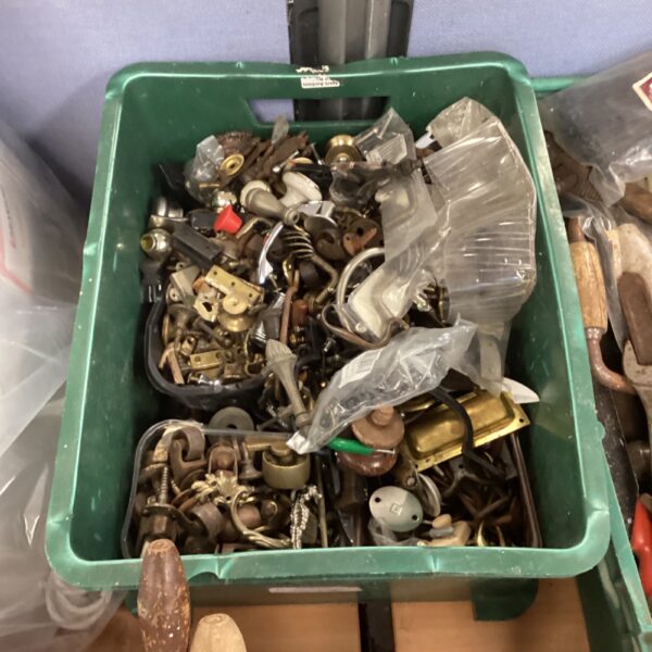 Mixed vintage hardware lot with hinges, screws and wheels.