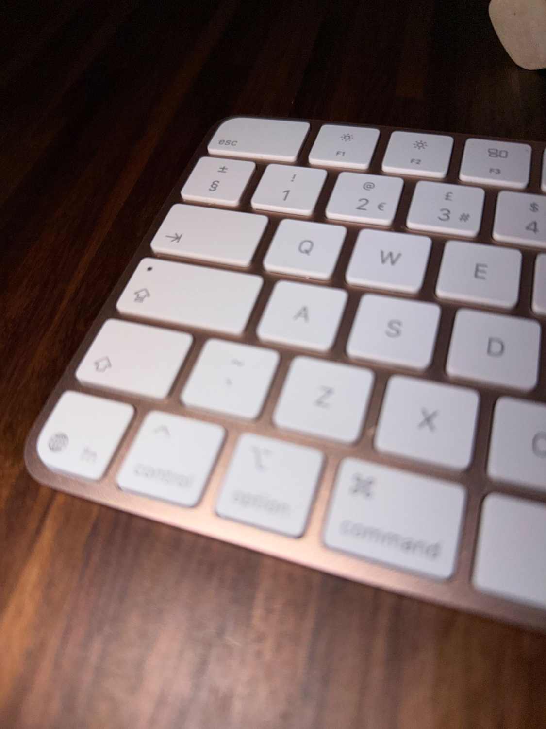 Close-up of a vintage mechanical keyboard with faded keys.