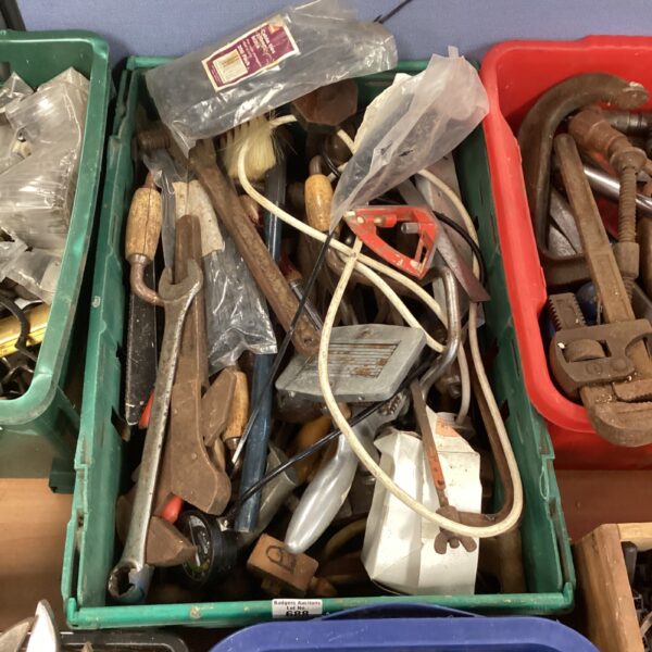Vintage spanners and tools in a metal box.