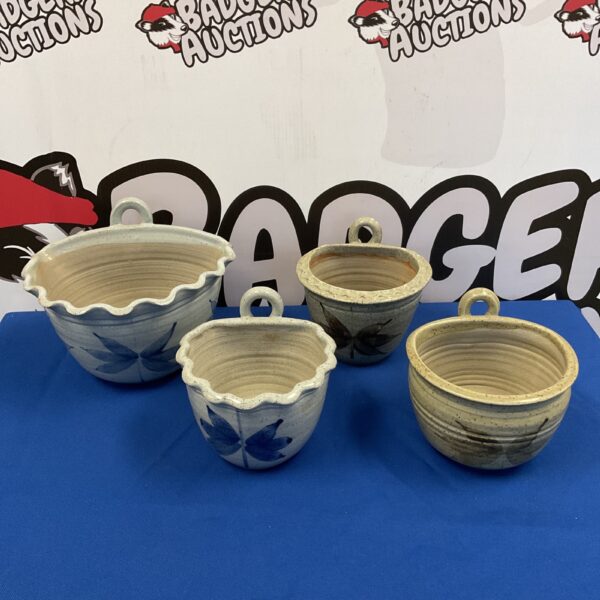 Set of four vintage Welsh pottery wall pockets for plants.